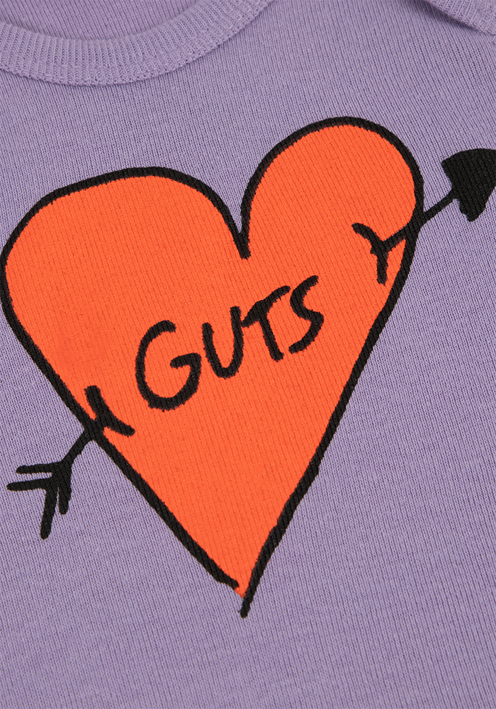 GUTS baby onesie detail