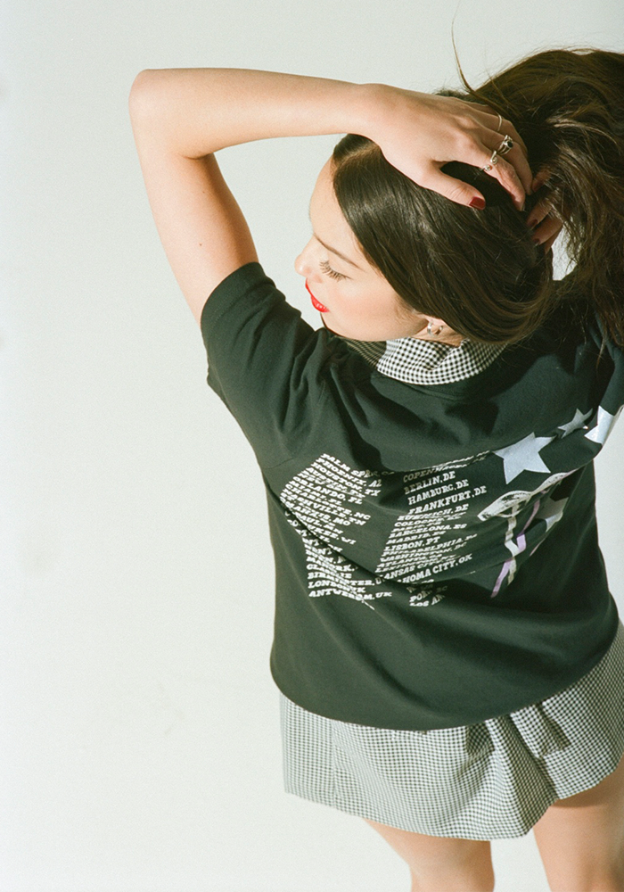 Olivia in GUTS world tour lollypop dateback t-shirt in black back