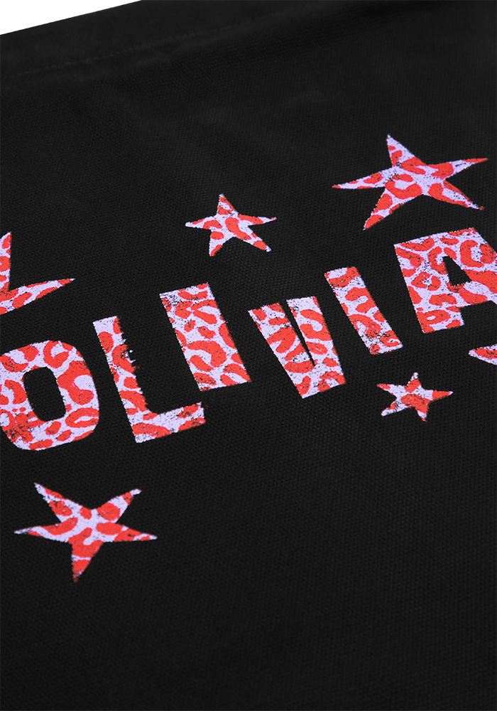 GUTS olivia patch book bag detail